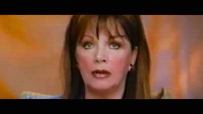 -[clears throat]
-[Laura] Jackie, um… - Lady Boss: The Jackie Collins Story