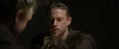-(CLICKS TONGUE)
-(MEN GRUNTING) - King Arthur: Legend of the Sword