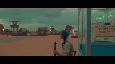 -CLIFFORD: Evening, soldier.
-(FOOTSTEPS APPROACHING) - Asteroid City