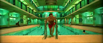 Clingy wet swimming trunks. Raphaël Poulain likes: peeling off large strips of wallpaper. - Amélie