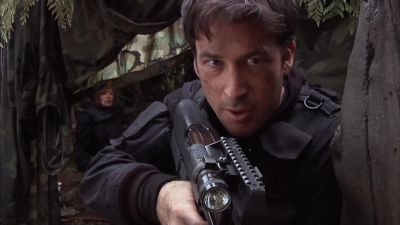 Clipped him in the arm.
Not enough to kill him, - Stargate Atlantis