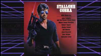 它没有出现在 Cobra
电影中，而是出现在当时的唱片公司 Scottie Brothers - In Search of the Last Action Heroes
