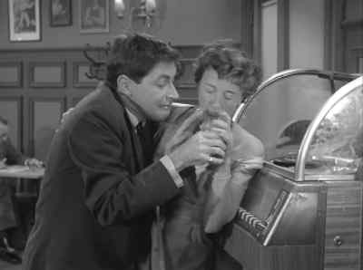 Come on, let's dance.
No, I got to play a record. - Alfred Hitchcock Presents