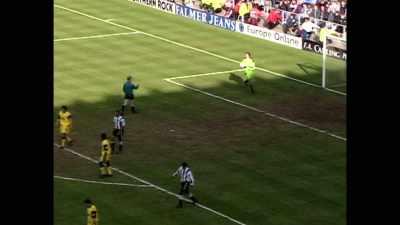 -[commentator 1]
He's collecting the ball.
-[whistle blows] - Fever Pitch: The Rise of the Premier League