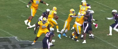 [commentator 2] McCray wrapped up, the
fumble, and it goes back to Jackson State. - Coach Prime