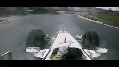 [commentator]
Button had a very steady first lap, - Brawn: The Impossible Formula 1 Story