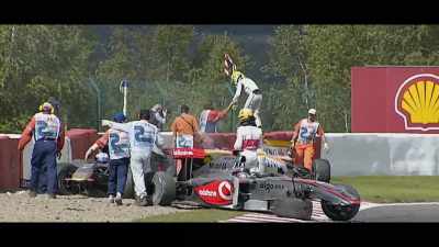[commentator] Jenson Button
jumping over the tyre barrier, - Brawn: The Impossible Formula 1 Story