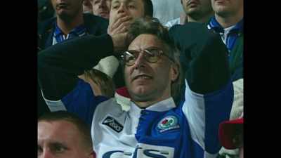 [commentator]
The Blackburn Rovers fans
here are asking tonight - Fever Pitch: The Rise of the Premier League