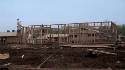 CONSTRUCTION WORKERS ARE EACH
TRAINED TO DO JUST ONE STAGE. - America in Color