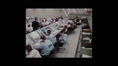 CONTROLLER OVER RADIO:
This is Apollo-Saturn launch control. - Armstrong