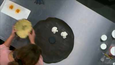 Cool. Okay. Now, we're gonna
add marshmallow. - Halloween Cookie Challenge