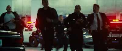(COPS SHOUTING INDISTINCTLY) - Taken