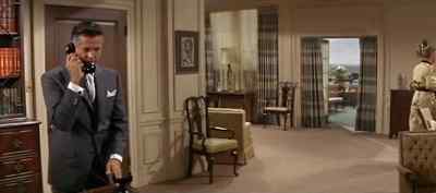 Could you hold it
just a moment, please? - The Carpetbaggers