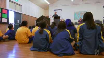 Could you please
put your hands together - The School That Tried to End Racism
