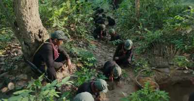 Cover it up. Use leaves, twigs, dirt. - First They Killed My Father