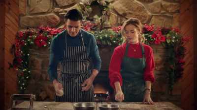 Crack the egg into the flour. - A Taste of Christmas