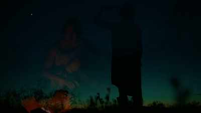 (crickets chirp)
(somber music continues) - Over The Red River