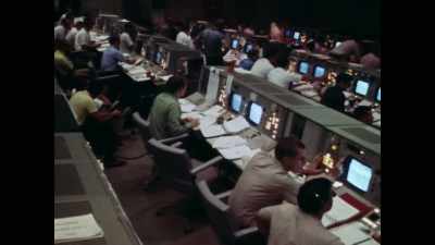 Cronkite: Keeping tuned now
 to mission control - Apollo: The Forgotten Films