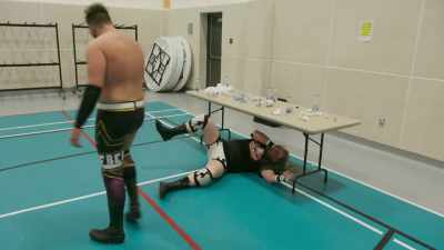 (Crowd chatter) - The Wrestlers