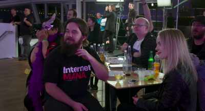 [crowd cheering] - Kim Dotcom: Caught in the Web