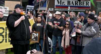 [crowd cheering] - Kim Dotcom: Caught in the Web