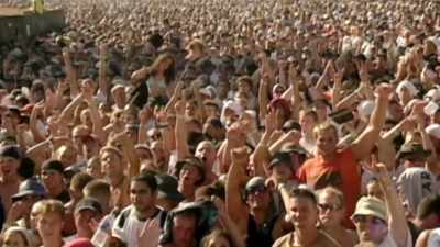 (CROWD CHEERING) - Woodstock 99: Peace Love and Rage