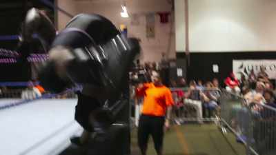 (Crowd murmuring) - The Wrestlers