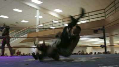 (Crowd yelling) - The Wrestlers