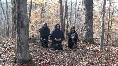 CULTISTS: (CHANTING)
Holy Satana, Holy Satana, - Bigfoot Exorcist