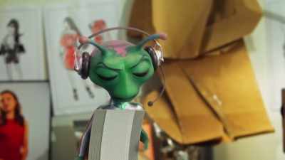 [curious muttering] - Alien TV