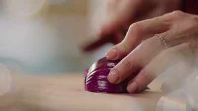 Cut this red onion
into fine half-moons. - Nigella: At My Table