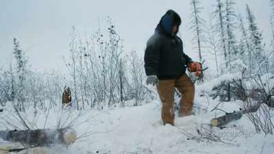Cuttin' the firewood,
bucking it up, stacking it, - Life Below Zero: First Alaskans