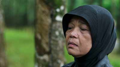 Cutting down her rubber trees - This Giant Beast That is the Global Economy