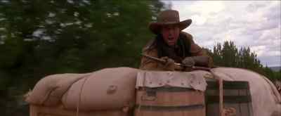 Damn it, Wyatt, move this wagon!
They're catching up! - Wyatt Earp