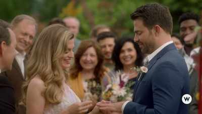 Darby, place the ring on Jake's
finger and repeat after me. - Wedding of a Lifetime