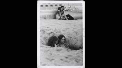 "David and Tommy in a Sandpit." - All the Beauty and the Bloodshed