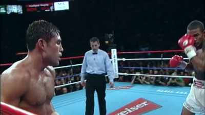 De La Hoya moving away, jabbing, - The Golden Boy