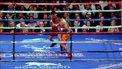 De La Hoya has zero answers
for the Pacquiao assault. - The Golden Boy