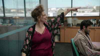 Deb looking toasty in the corner. Snuggy. - The Office