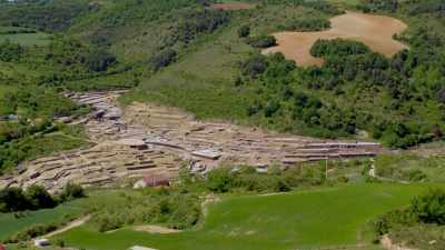 Deep below the valley,
water courses up through the remains - Europe From Above