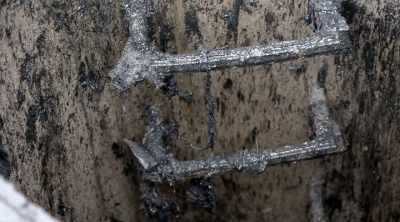 Deeper down, the blockage
has solidified - Sewer Divers