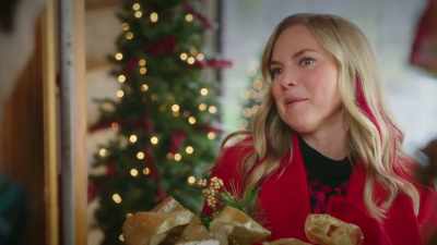Delivering gifts that have been
wrapped, that were ordered. - Unwrapping Christmas: Olivia's Reunion