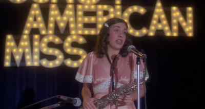 ♪ Delta Dawn, what's
that flower you have on - Smile