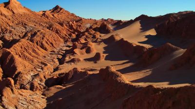 Deserts may appear to be barren and empty, - Our Planet