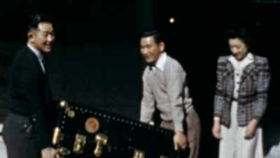 DESPITE THEIR SMILES
FOR THE CAMERA, - America in Color