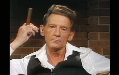 Did he go through the...
What's that in your hand there?
A cigar? - Jerry Lee Lewis: Trouble in Mind