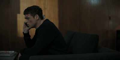 [distant siren as TV blares in background] - Bodyguard