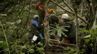 Diver Alessandro Reato
begins to rappel - Lost Treasures of the Maya