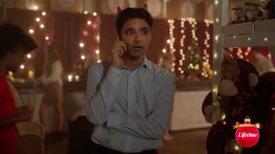  Does she have her phone
 turned off? - Under the Christmas Tree