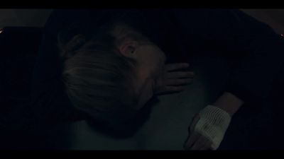 [dogs barking in distance] - The Handmaid's Tale